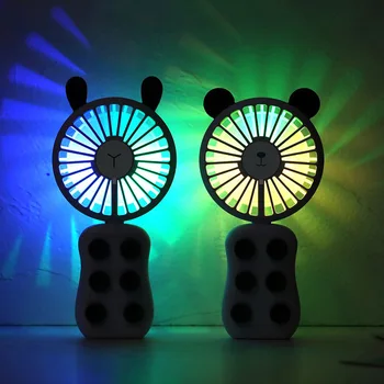 

Hot New Portable Mini Chargeable Fan with Silicone Suction Cup Can Be Used for Mobile Phone Holder Fan HY99