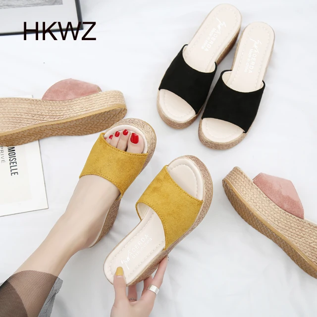 

2019 new wedge with muffin bottom women's slippers thick bottom fish mouth high heel sandals non-slip women's wild slippers 7cm