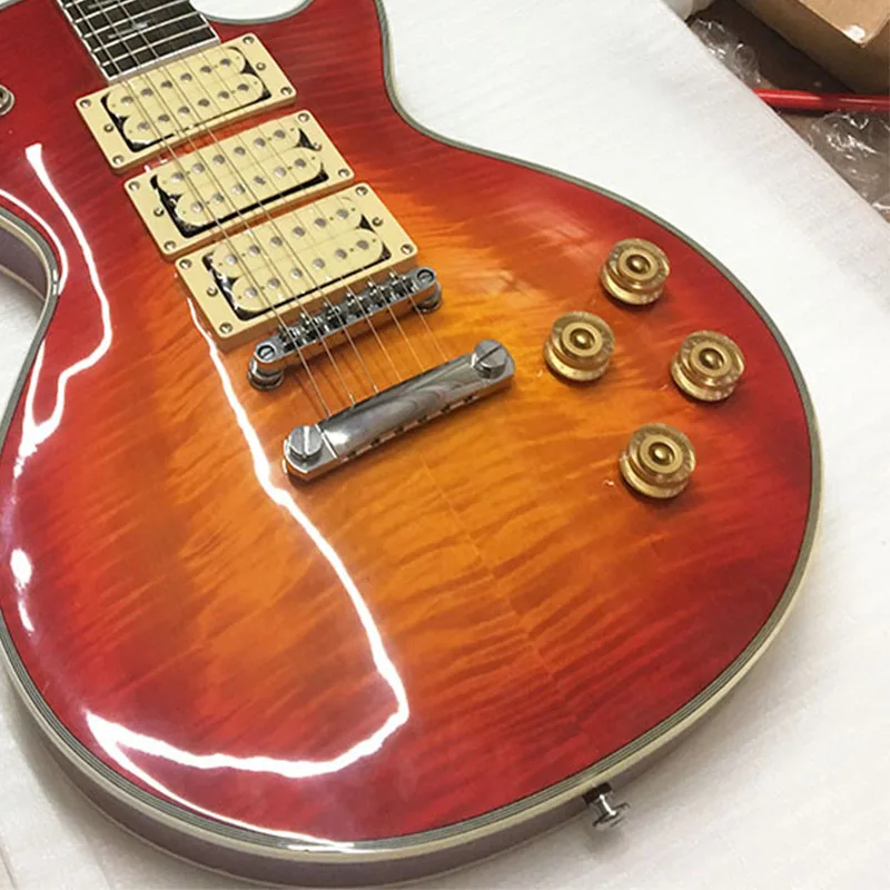 

High quality electric guitar red paint, tiger maple veneer, three pickups, lightning inlay, free shipping