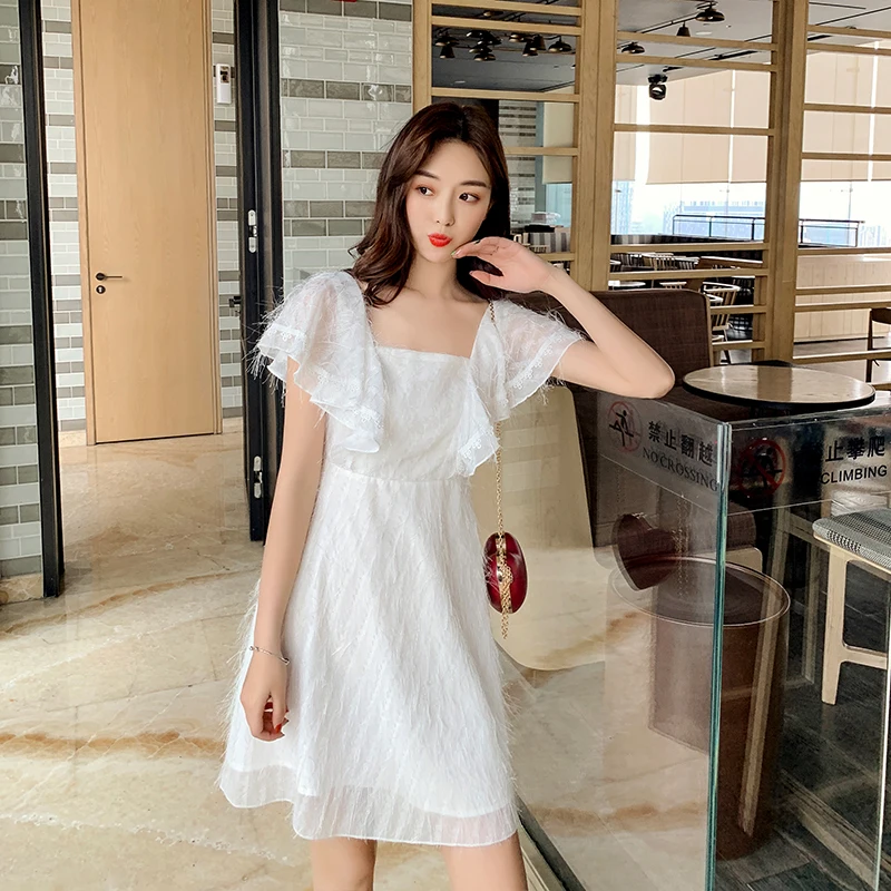 EAD French Style Square Collar Ladies Vintage Summer Dresses White Tassel Backless Women Elegant Dress New a Line Mini Sexy Robe EAD French Style Square Collar Ladies Vintage Summer Dresses White Tassel Backless Women Elegant Dress New a Line Mini Sexy Robe