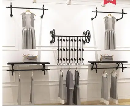 Clothes store display rack wall men's and women's wear vintage shelves children's wear wall hanging clothes rack rack display .
