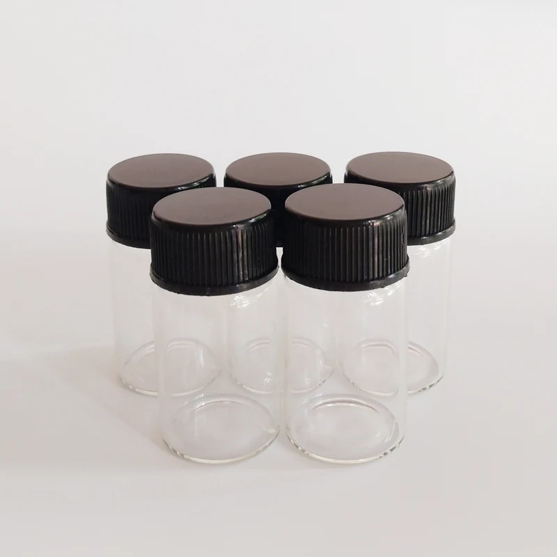 

50pcs/lot 7ml empty glass bottle with Black lid 22*40mm Plastic Screw cap Candy glass vials Small Dry goods Storage bottle