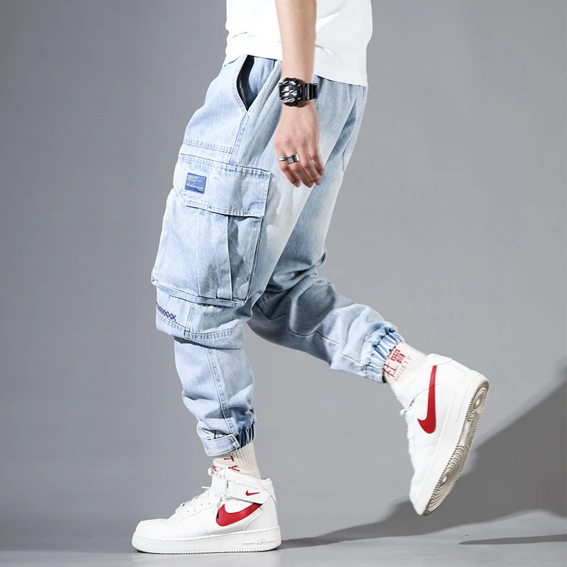 Fashion Streetwear Men Jeans Light Blue Loose Fit Multi Pockets Cargo Pants Harem Jeans Men Embroidery Designer Hip Hop Joggers