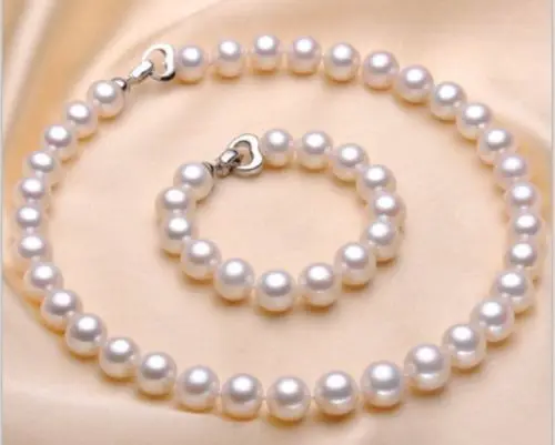 

Free Shipping >>>>>a set of 10-11mm natural south sea white pearl necklace bracelet silver clasp