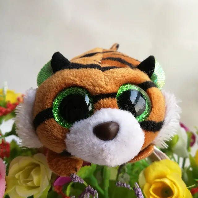 大きい緑色の目をした虎のぬいぐるみ