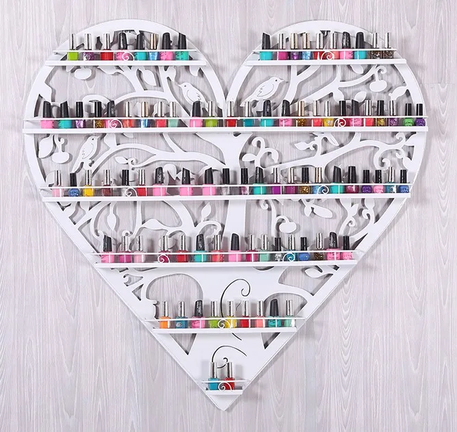 Nail polish store shelves display shelf. Hanging frame, wrought iron heart cosmetics.