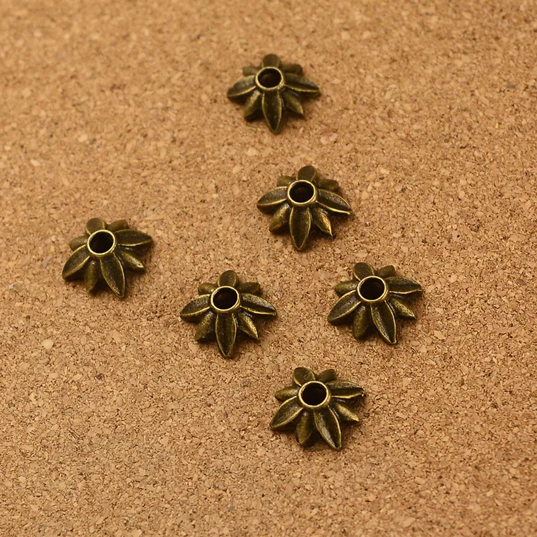 

Wholesale vintage 280pcs antique bronze flower cap bead charm diy jewelry Findings 2.5mm hola dia
