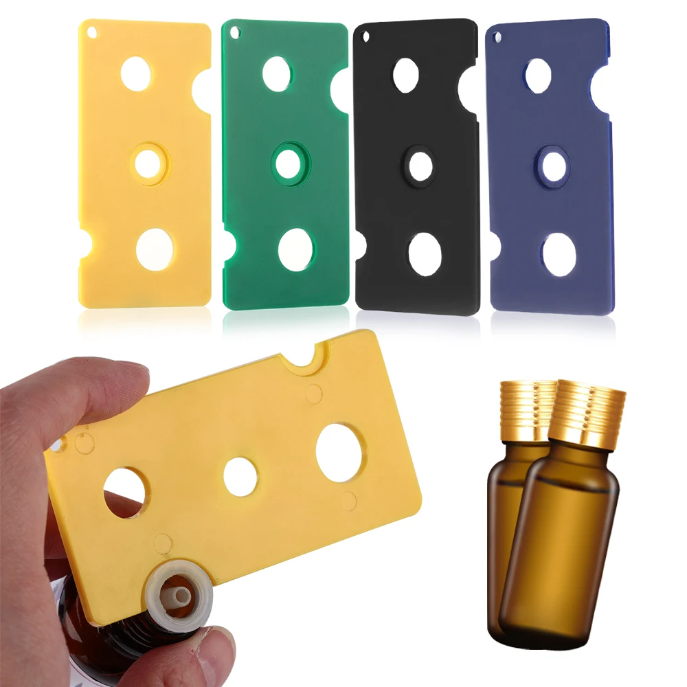 

Random Color! 1pc Portable Essential Oil Opener Useful Roller Balls Remover Essential Oil Sub-bottle Bottle Caps Open Key Tool