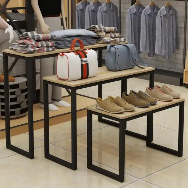 

Shopping mall clothing in the island cabinet display rack small table high and low bag display table