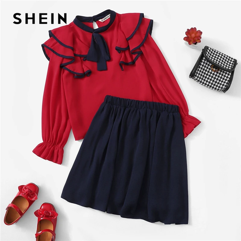 

SHEIN Kiddie Girls Stand Collar Bow Front Tiered Layer Blouse And Pleated Skirt Set 2019 Spring Long sleeve Preppy Kids Outfits