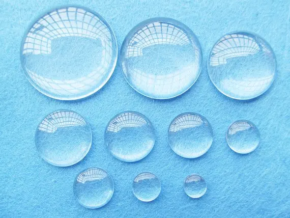 

200pcs 14mm Round Clear/Transparent Glass Cabochons/Cover Cabs,Pendants Domed for Photos,Cabochons, or Art,For Base Setting Tray