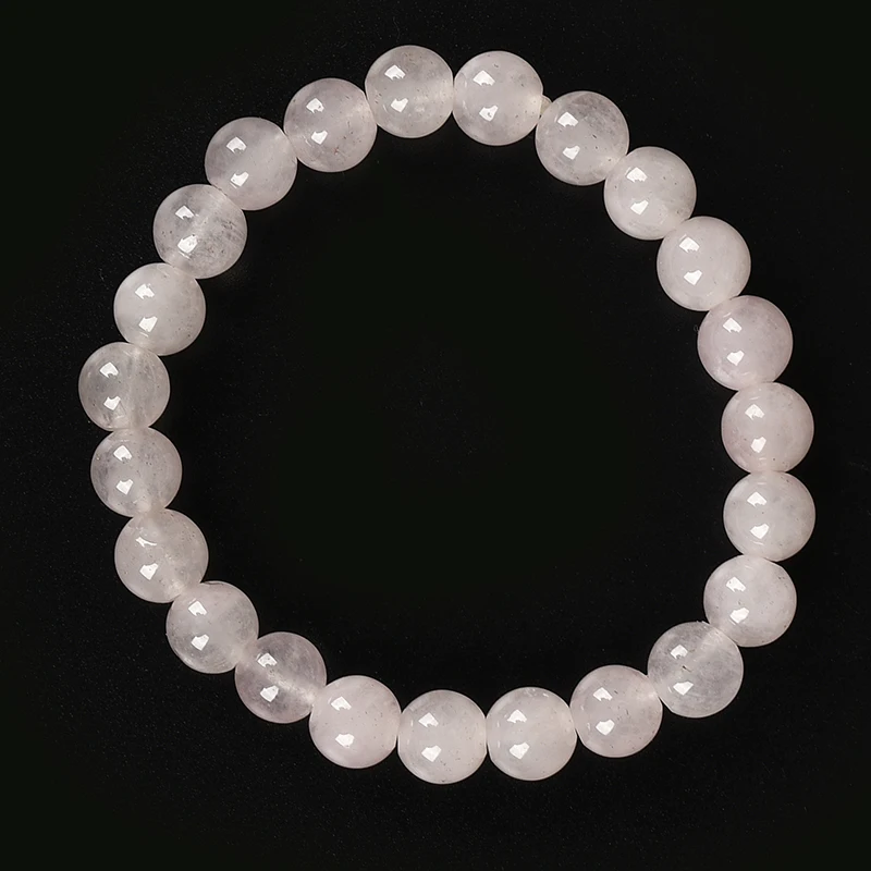 

10 MM Girlish pink Rounded and Transparent smooth rose quartz Bracelet The bracelet for ladies and girls .