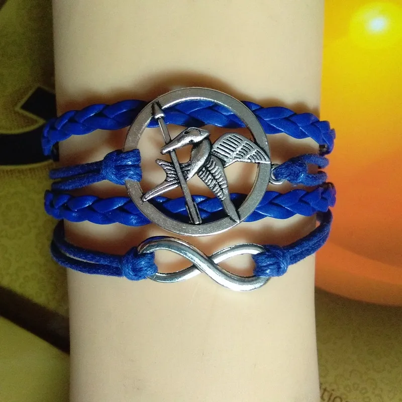 

2018 New Leather Bracelet Multilayer Bracelet Hunger Game Bracelet Silver Badge Ridicule Bird& Infinite Symbol Bracelets 11Style