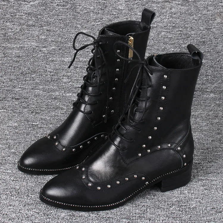 Boots children 2018 autumn and winter new rivets women's boots Europe and the United States thick with leather Martin boots.