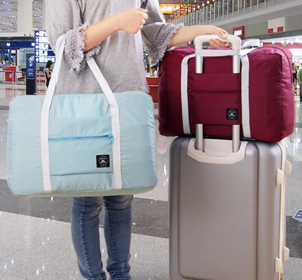

WaterProof Travel Bag Large Capacity Bag Women Nylon Folding Bag Stuff Unisex Luggage Travel Handbags travel trolley Bag