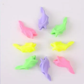 

Quality silicone dolphin fish hold a pen device child student corrected pencil grasp Pen And Pencil Grip loops Small wholesale