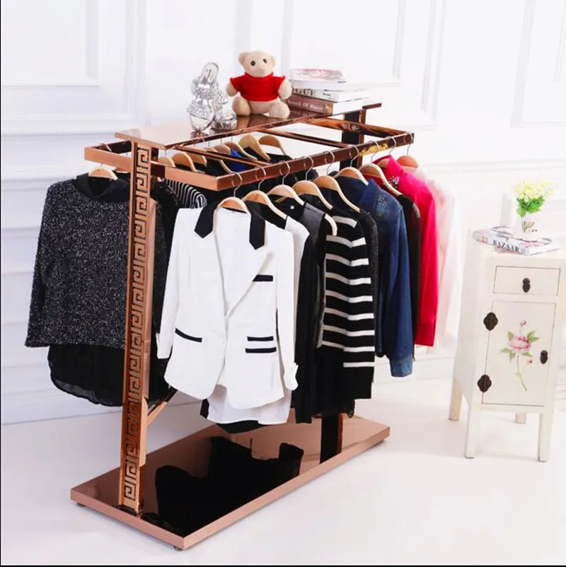 

Rose gold coat hanger display rack Floor rack for colthing