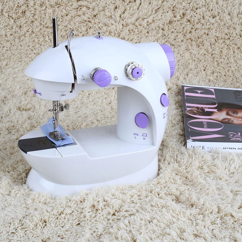 

Mini Electric Portable Desktop Sewing Machine Hand Held Household
