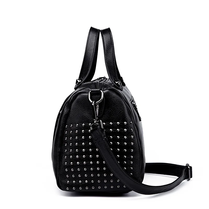 Ms. new European and American style wind rivet leather cowhide pillow bag Real leather white cross-type portable leather shoulde