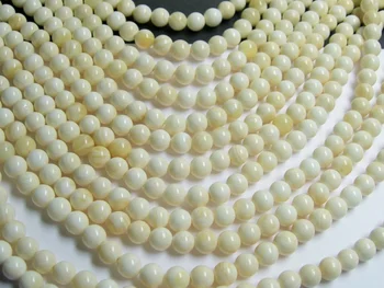 

2017 New Direct Selling Metal Round-brilliant-shape Beautiful Of 6mm Round Cream Tridacna Beads 60pcs Loose A Lot