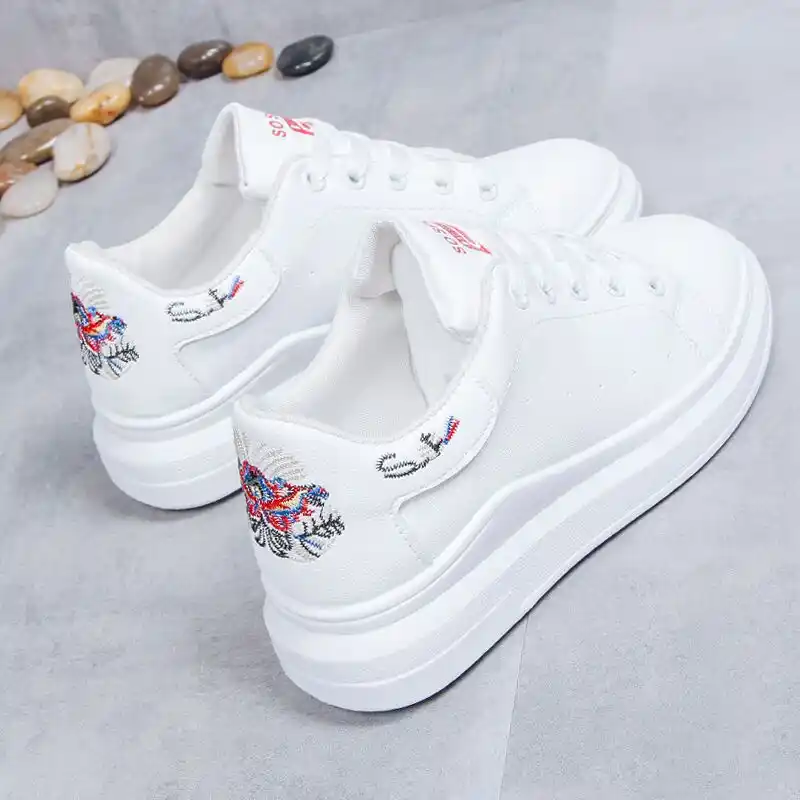 white embroidered shoes