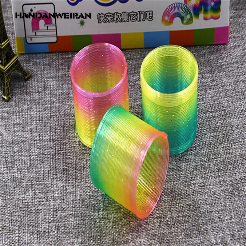 

2019 New 1PC Kids Magic Plastic Rainbow circle Children Funny Classic Toy Random color