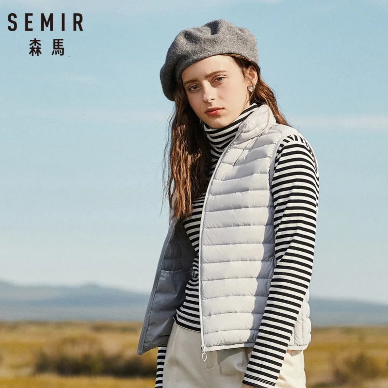SEMIR Women Packable Quilted Lightweight Down Vest with Zip Pocket Light Puffer Stand-up Collar Vest Chinlon Lined with Zip SEMIR Women Packable Quilted Lightweight Down Vest with Zip Pocket Light Puffer Stand-up Collar Vest Chinlon Lined with Zip
