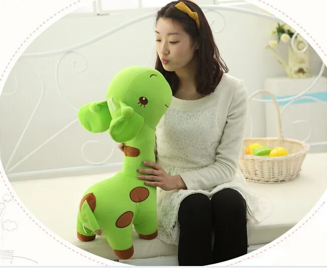 green giraffe stuffed animal