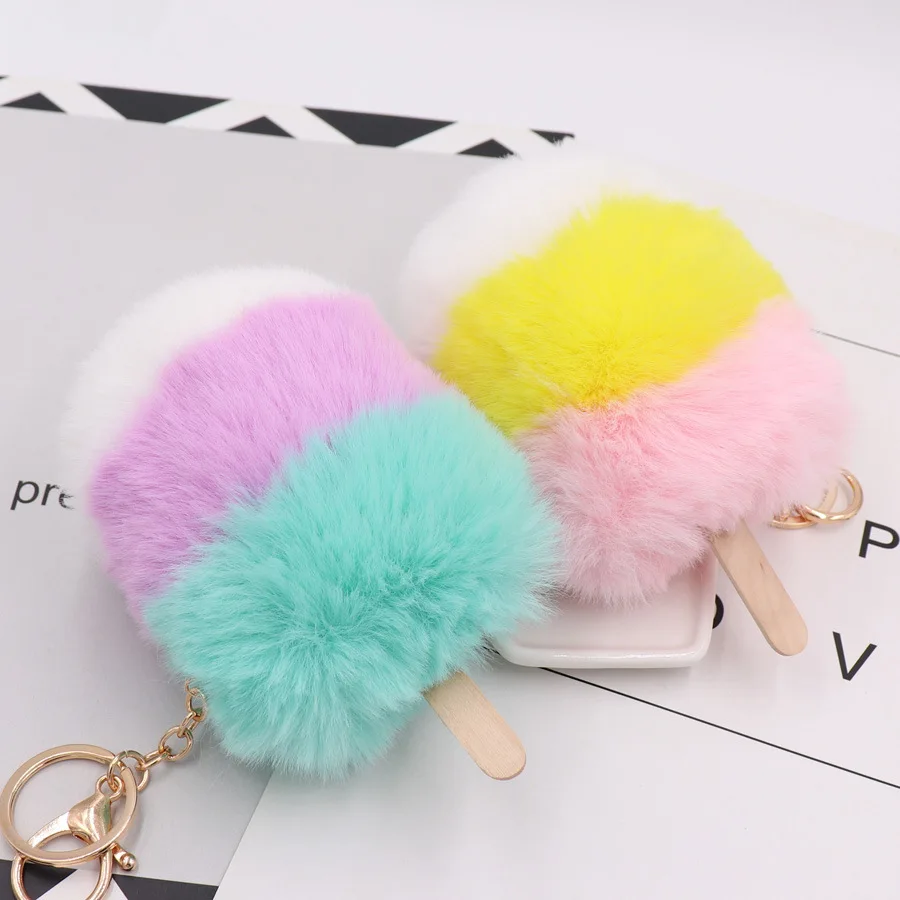 Source Hot Sale Key Chain Pom Pom Puff Ball Fruit Mint Lip Oil