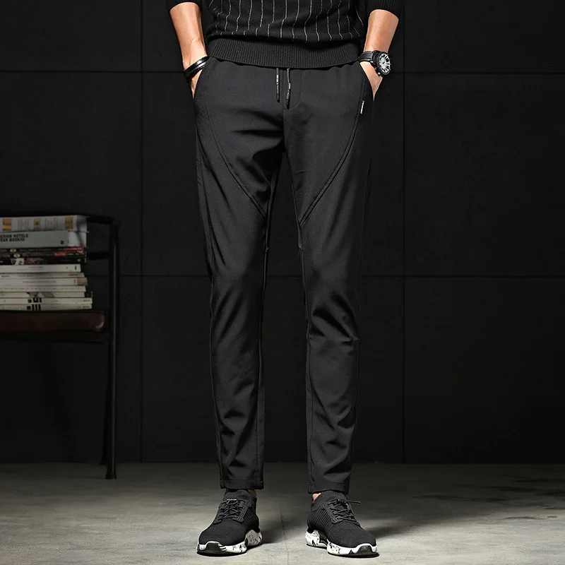 

New men's sports and leisure pants Youth Korean version of the trend of self-cultivation sweat-absorbent and quick-drying pants