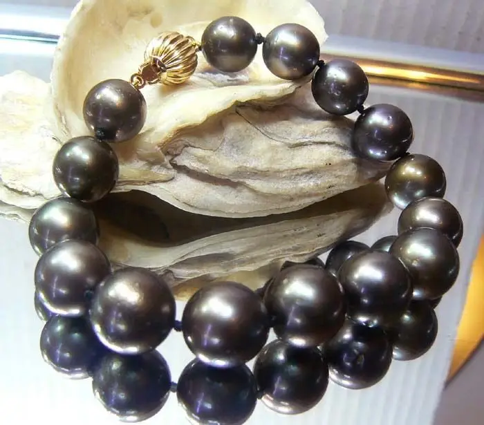 

0446 RARE TAHITIAN BLACK SOUTH SEA SALTWATER PEARL GOLD BRACELET