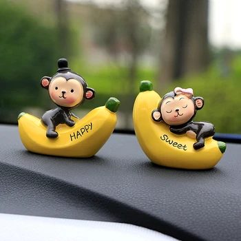 

2pcs/set Car Ornament Cute Artificial Resin Sweet Monkey on Banana Figurines Craft Cartoon Decoration Decor Lovely Toys Gifts