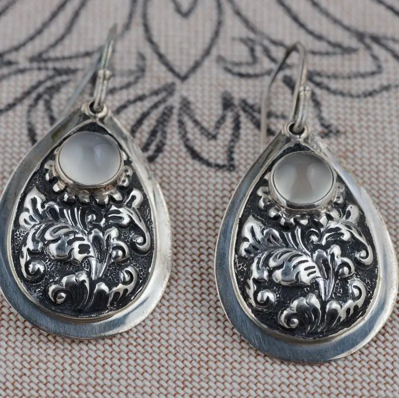 

Sterling Silver earrings wholesale silver S925 silver inlaid natural Moonstone Earrings high-end imported technology