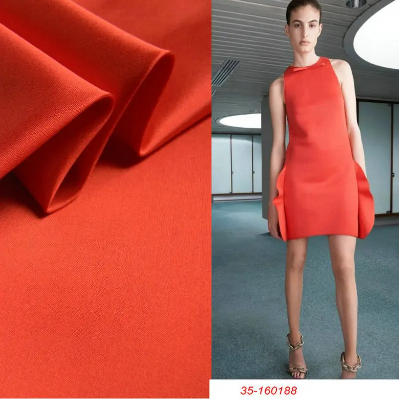 

Heavy silk wool orange bruge wide formal dress fabric