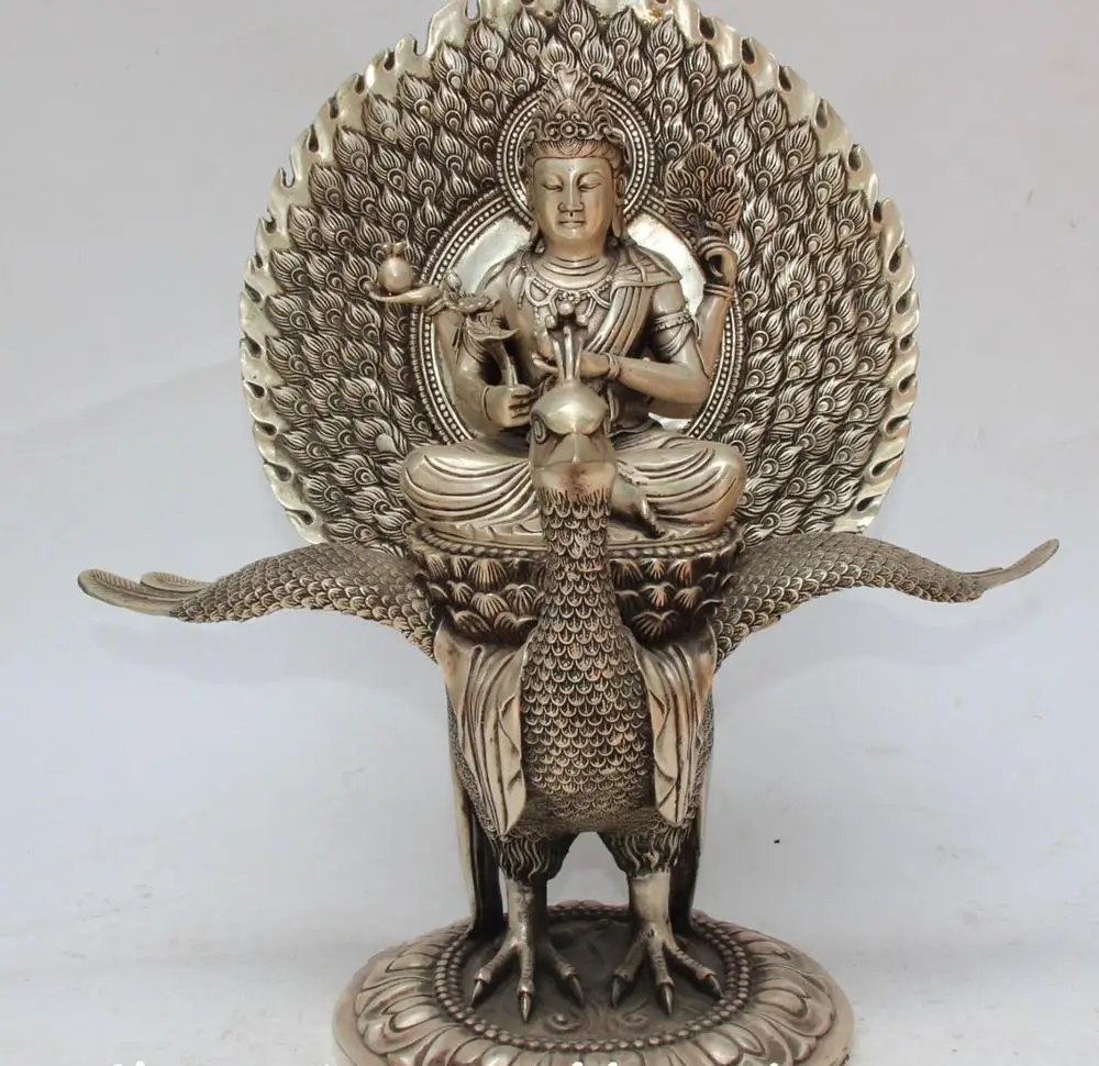 

18" Tibet Silver 4 Arms Kwan-yin Guanyin Goddess Ride Peacock Peafowl Statue