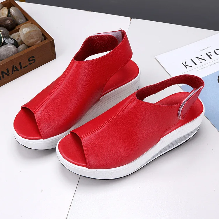 

2018 new rocking shoes female summer sandals thick bottom magic wedge wedges waterproof platform fish mouth large size sandals