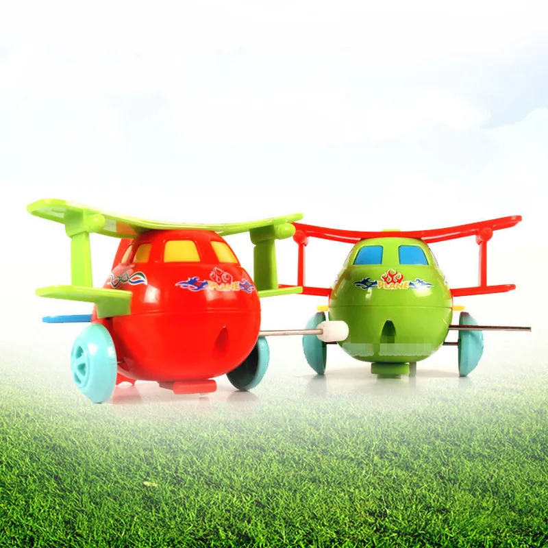 

1PC Kids Clockwork Toys Cartoon Plastic Airplane Model Wind Up Toys Running Clockwork Spring Toy for Children Gift Random Color