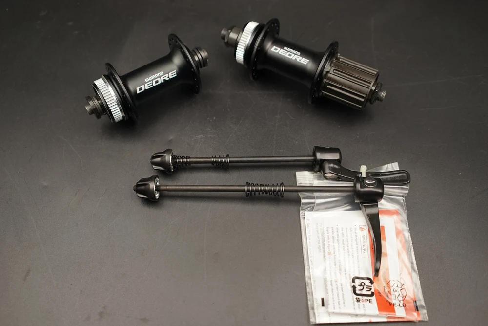 Передняя и задняя ступицы Shimano Deore HB M615 центральный замок передний QR 9x100 мм/задний
