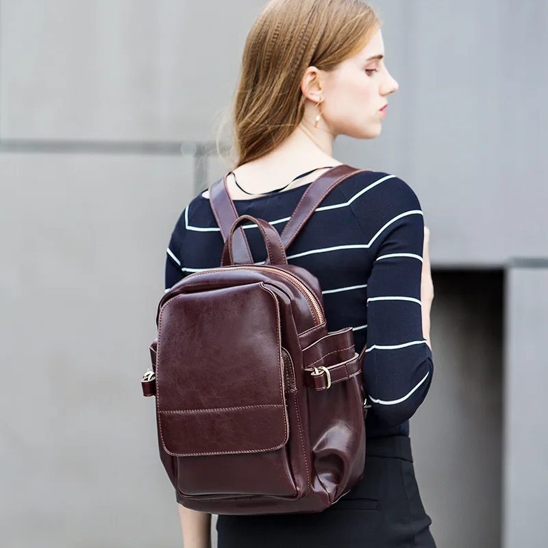 

Fashion oil wax leather backpack just the right buckle plasticity highlights the feminine style luxury brand women's travel bag