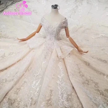 شراءفستان زفاف فاخر برقبة عالية بكريستال من رداء دي ماريج 2019 عاري الكتفين بشرابة من الخلف