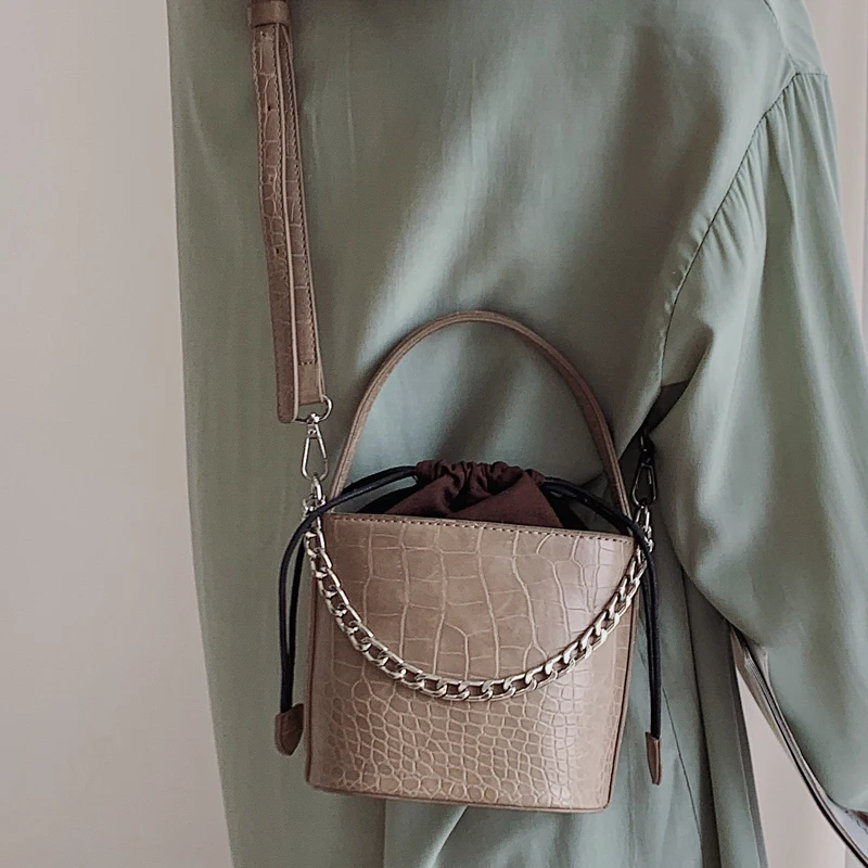 

Bag for women 2019 new Korean version of the texture of the retro stone pattern portable bucket bag black wild Messenger bag