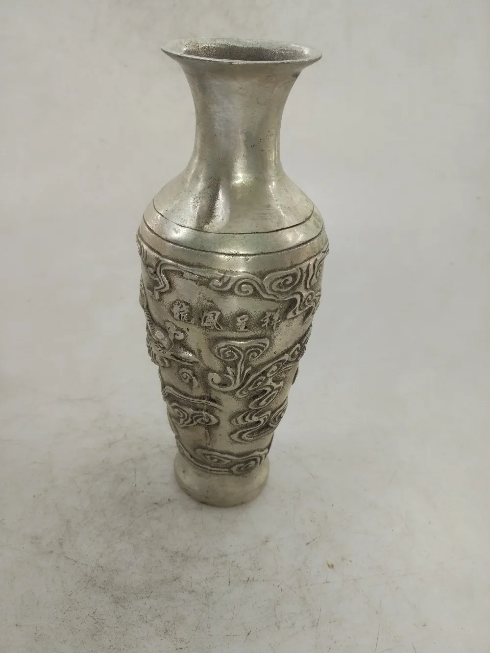 

Chinese hand carved white copper Qing Dynasty Emperor Qianlong Emperor era dragon and phoenix vase pair
