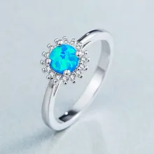 

Exquisite fashion creative opal ring jewelry Sun Flower Zircon and Opal gems Ring AliExpress wholesale small jewelry Hot selling