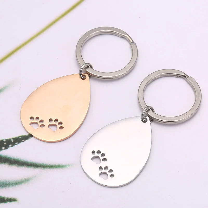 

Europe And America Charm Stainless Steel Key Chain Jewelry Pet dog footprints Pendant Key Chain Jewelry