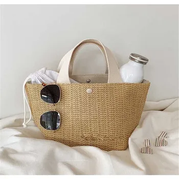 

Pure hand knittingd esign popular grass weaving fashion portable bucket bag for woman Tote bag Free mailing