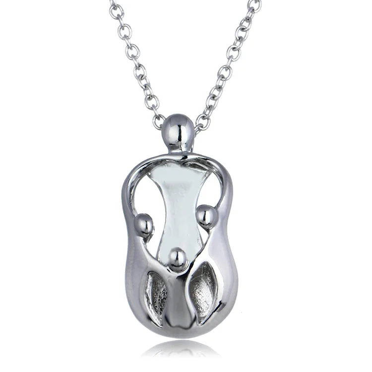 mother holding baby necklace