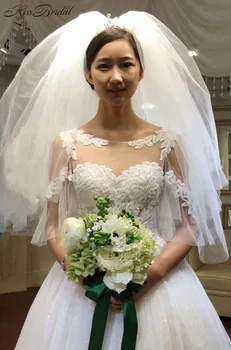 شراءVestidos دي Novia أحدث فساتين الزفاف الرومانسية 2018 فاخر كاتدرائية القطار الرباط تول ثوب زفاف العروس