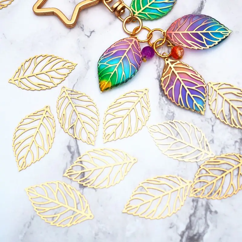 

100 pcs/Pack Openwork Leaf Metal Flower Frame Pendant Charm DIY UV Resin Necklace Jewelry Making