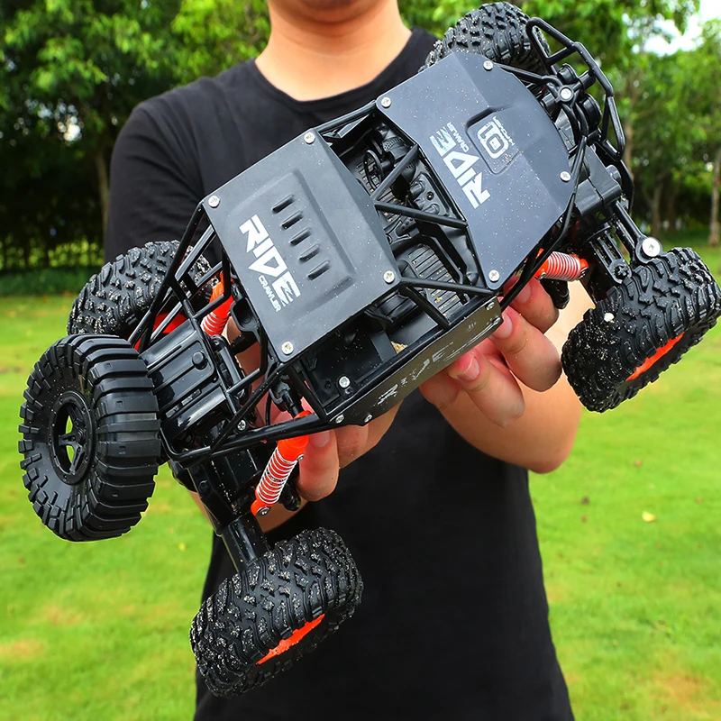 

Outdoor Fun 2.4G 4WD rc car remote control toy 1:14 alloy drive remote crawler cars Bigfoot Off-Road Vehicle Wheel changeable