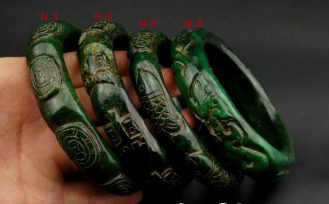 

Collection of 4 models of fine carved dragon and Anchovy pattern, jade bracelet free of freight